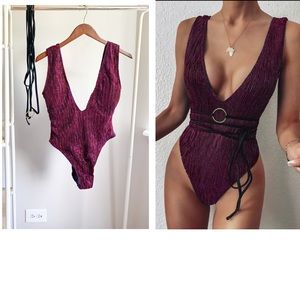 Plunging neckline one piece suit